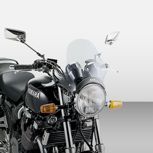 Aerodynamic protectors for naked motorcycles